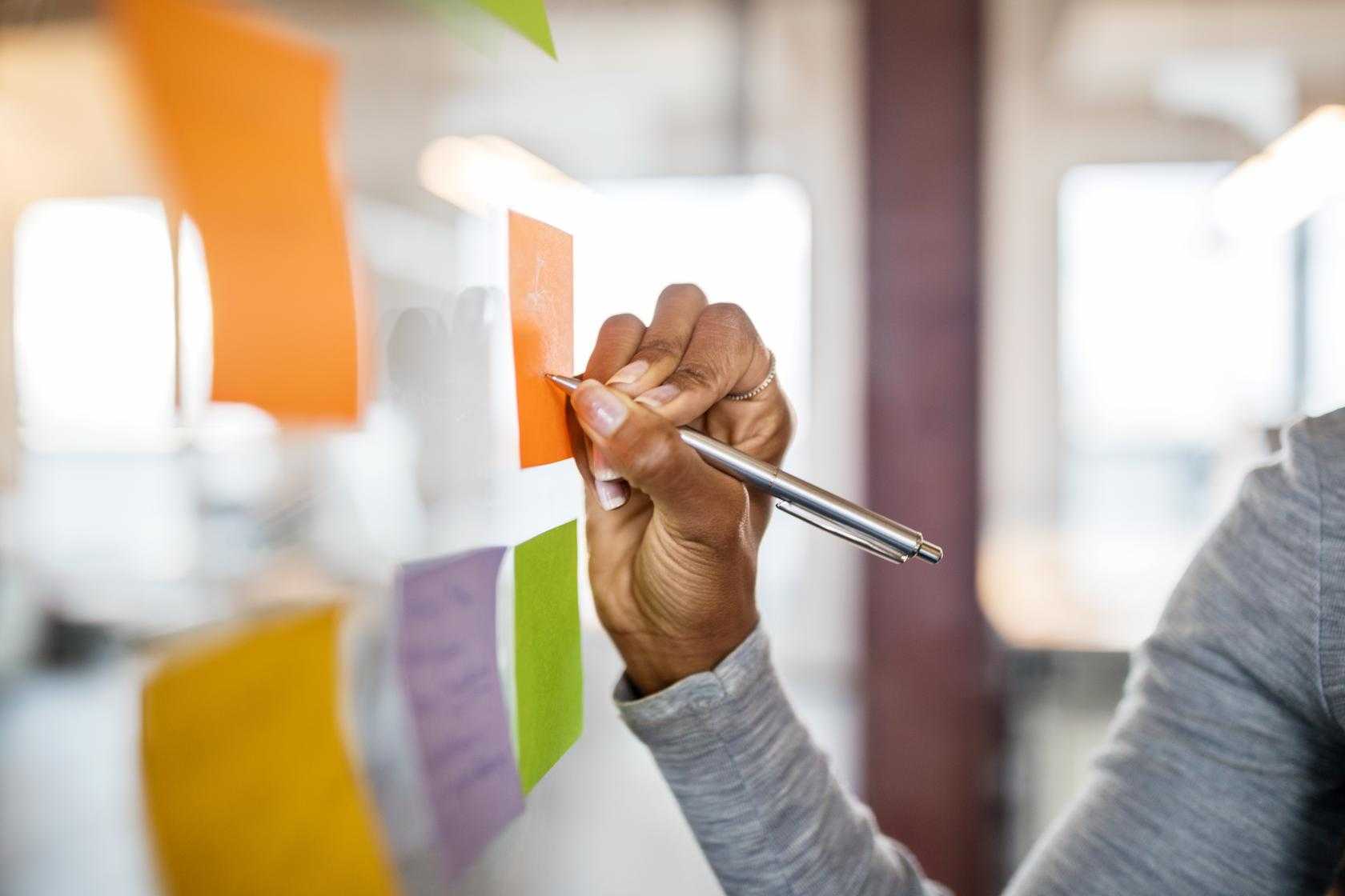Writing on sticky notes